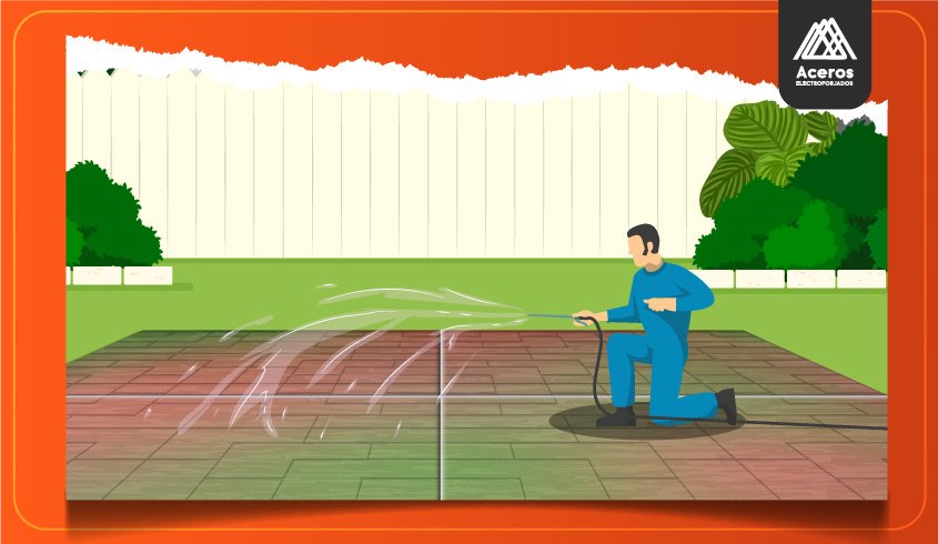 Gráfico de hombre lavando piso de concreto estampado con manguera y abundante agua 